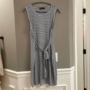 Sleeveless Navy blue and white striped dress.